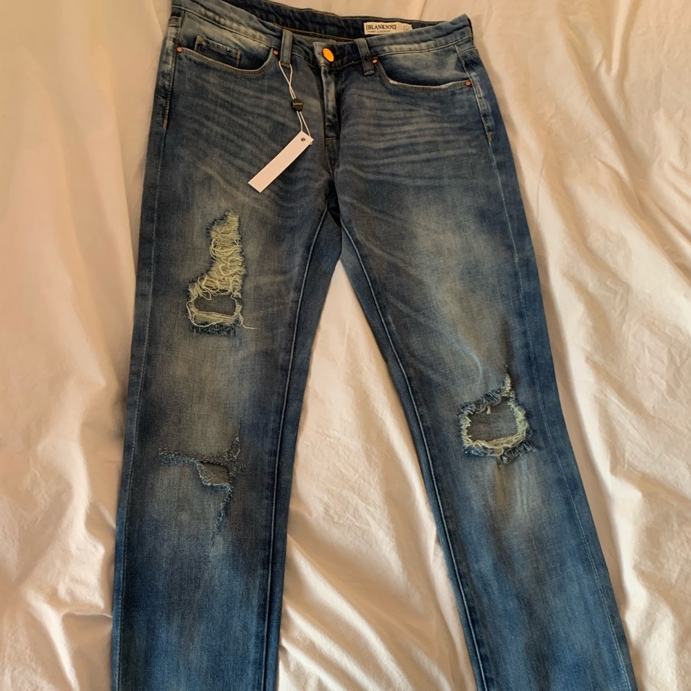 Skinny high rise mildly destructed denim